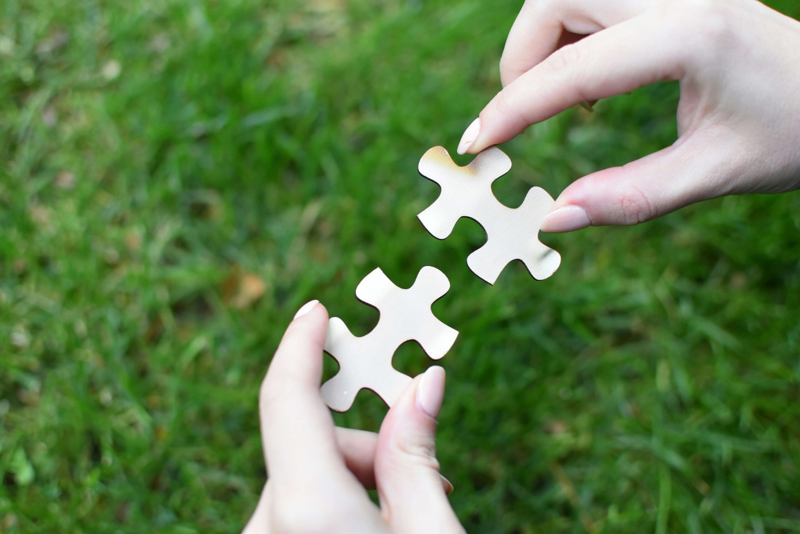 Jigsaw piece representing bringing together partners